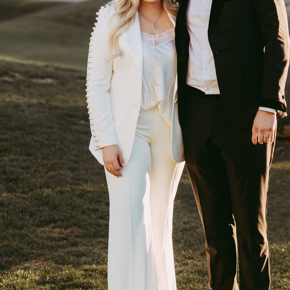 Nadine Merabi white Pearl suit